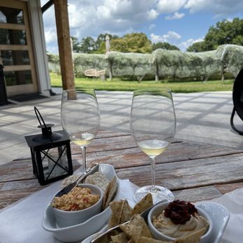 Cloudland Vineyards and Winery - two plates of food and two glasses of wine - Wineries Near Me - Buford, Georgia Cloudland Vineyards and Winery - two plates of food and two glasses of wine - Wineries Near Me - Buford, Georgia