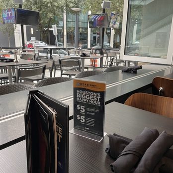 Tom's Watch Bar - Sitting in the inside, looking at the outside - Sports Bars Near Me - Houston, Texas