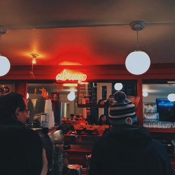 Abraco - Counter space~ I took a low exposure photo to capture the neon sign, so do not fret! It's not actually this dark. - Coffee Roasteries Near Me - New York, New York