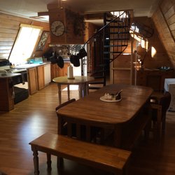 Lazy-Daze-Retreats - Dining room and kitchen. Plenty of room for the family or group gathering for a meal.