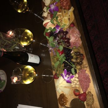 The Cellar - A Wine Library - Plank with cheese fruit and charcuterie....Delicious combo of flavors to swirl with your wine - Wine Bars Near Me - Pasadena, California