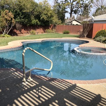 Parrott Pools - AFTER - My beautiful new pool with new railings, a new tile surround and new pebble surface. - Pool & Hot Tub Service Near Me Parrott Pools - AFTER - My beautiful new pool with new railings, a new tile surround and new pebble surface. - Pool & Hot Tub Service Near Me