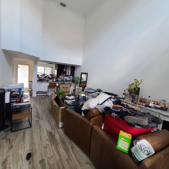 The Spruced Space - Before: unpacking day, living room. More stuff everywhere (and my pup) - Home Organization Near Me The Spruced Space - Before: unpacking day, living room. More stuff everywhere (and my pup) - Home Organization Near Me