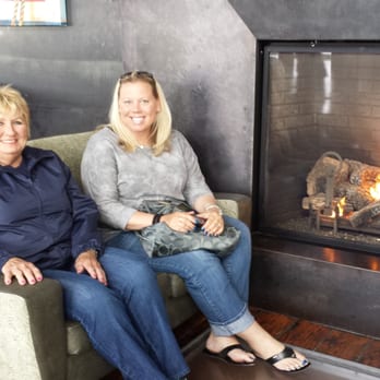 Bridgewater Bistro - Love the fireplace with the clear floor underneath - New American Near Me - Astoria, Oregon
