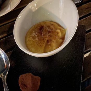 La Terrasa de les Indianes - Crème de Catalan with a chocolate truffle. - Cocktail Bars Near Me - Barcelona, B La Terrasa de les Indianes - Crème de Catalan with a chocolate truffle. - Cocktail Bars Near Me - Barcelona, B