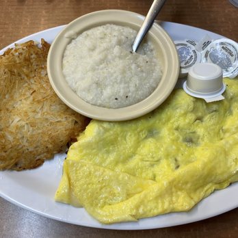 Melissa's Country Cafe - Mushroom and Swiss cheese omelette with hash browns and grits - Breakfast & Brunch Near Me - Bowling Green, Kentucky
