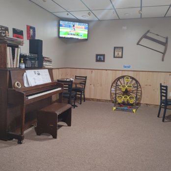 Mark's Tavern - a piano in the corner of the room - Pubs Near Me - East Windsor, Connecticut