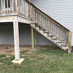Bracy Construction - Built the support system for the stairs before they were literally hanging just screwed into the side of the deck