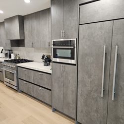 David Does It All - Cabinets were installed minimalist with no handles, I drilled new handles precisely into all of them