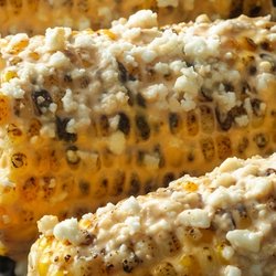 Margaritas Mexican Restaurant - Street corn rolled in chipotle sauce and topped with Parmesan cheese