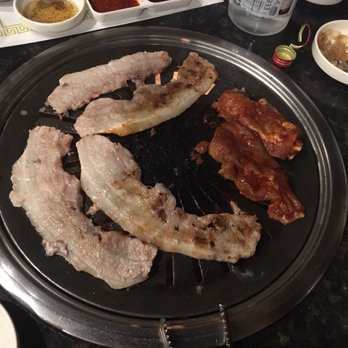 Cham Soot Gol - Pork belly goodness on the left and spicy chicken on the right! :) - Korean Near Me - Buena Park, California Cham Soot Gol - Pork belly goodness on the left and spicy chicken on the right! :) - Korean Near Me - Buena Park, California