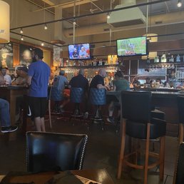 people sitting at the bar people sitting at the bar