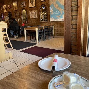 Caffe Roma - empty plates of food on a table - Italian Near Me - Cleveland, Ohio