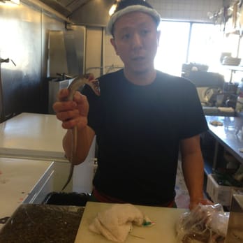 Tokkuri-Tei - Chef Ryuji showing off his japanese imported freshwater eel...amazing casual culinary experience! Reads your palette like a book - Sushi Bars Near Me - Honolulu, Hawaii Tokkuri-Tei - Chef Ryuji showing off his japanese imported freshwater eel...amazing casual culinary experience! Reads your palette like a book - Sushi Bars Near Me - Honolulu, Hawaii