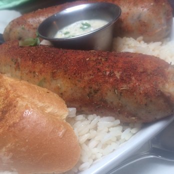 Pappadeaux Seafood Kitchen - Boudin served over dirty rice - Cajun/Creole Near Me - Norcross, Georgia Pappadeaux Seafood Kitchen - Boudin served over dirty rice - Cajun/Creole Near Me - Norcross, Georgia