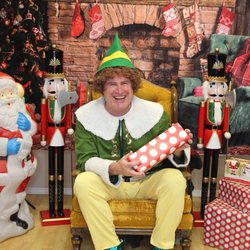 The Giving Tree Salon - We love our community. This is a photo from our "Photos with Buddy the Elf," Maslow Project Fundraiser.