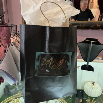 Dark Garden - I fought a peacock feather fan and a fun book about famous female poisoners - Lingerie Near Me - New Orleans, Louisiana