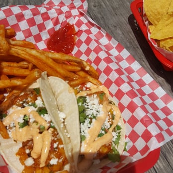 Ski Shores Cafe - Shrimp tacos! I substituted chips and salsa for the fries. Everything was very yummy! - Burgers Near Me - Austin, Texas