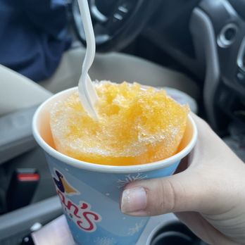 Pelican's Snoballs - Wake Forest - a person holding a drink in a cup - Desserts Near Me - Wake Forest, North Carolina Pelican's Snoballs - Wake Forest - a person holding a drink in a cup - Desserts Near Me - Wake Forest, North Carolina