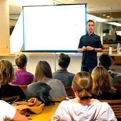 Jeff Rothschild, MS, RD- TriFit Club & Studios - Jeff giving a talk to a group of triathletes