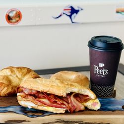 Reds Rolls - A Reds Rolls Classic egg and Bacon sanga, served in a roll, croissant or bagel.