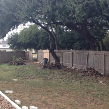 Garcia Lawn Care Service - Had trees trimmed - fence panel removed - absolute mess in that corner. - Landscaping Near Me
