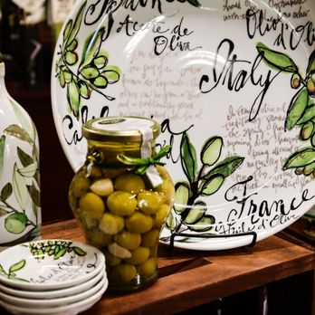 Sedona Divine Olive Oils - a jar of olives and plates - Olive Oil Near Me - Sedona, Arizona Sedona Divine Olive Oils - a jar of olives and plates - Olive Oil Near Me - Sedona, Arizona