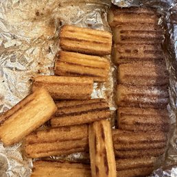Churros were a little overdone and burnt tasting sadly Churros were a little overdone and burnt tasting sadly