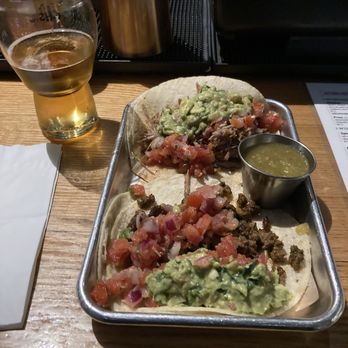 Raleigh's Pub - 2 tacos. 1 carne asada and 1 carnitas. - American Near Me - Berkeley, California