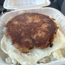 Mini Corned Beef Hash and one egg over rice.