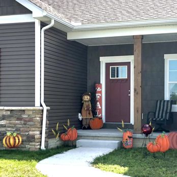 Schumacher Homes - Bowling Green - front porch with pumpkins - General Contractors Near Me Schumacher Homes - Bowling Green - front porch with pumpkins - General Contractors Near Me
