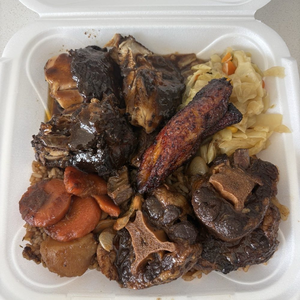 Oxtails and Jerk Chicken with Cabbage and Rice & Peas Oxtails and Jerk Chicken with Cabbage and Rice & Peas