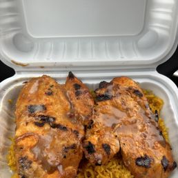 jerked chicken breast in garlic sauce with peri peri rice jerked chicken breast in garlic sauce with peri peri rice