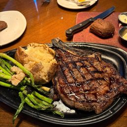 Bone in 20oz Ribeye perfectly medium rare.