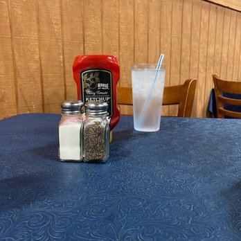 Cartwright's Ranch House - a table with salt and pepper shakers - Breakfast & Brunch Near Me - Denton, Texas