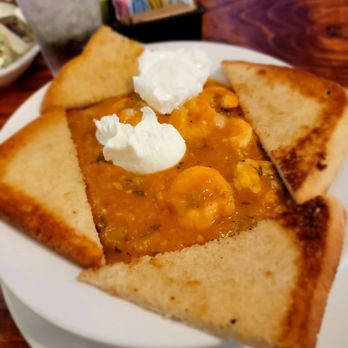 Wakin' Bakin' - Shrimp ettoufee grits - Breakfast & Brunch Near Me - New Orleans, Louisiana Wakin' Bakin' - Shrimp ettoufee grits - Breakfast & Brunch Near Me - New Orleans, Louisiana