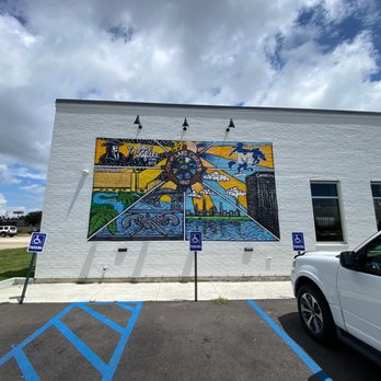 Fat Pat’s - a mural on the side of a building - New American Near Me - Lake Charles, Louisiana