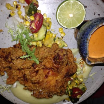 Tigerlily - Tikka Masala Fried Chicken made with tumeric, buttermilk marinade, deepak's tikka masala, summer succotash and a buttermilk mash. $25 - Indian Near Me - Berkeley, California Tigerlily - Tikka Masala Fried Chicken made with tumeric, buttermilk marinade, deepak's tikka masala, summer succotash and a buttermilk mash. $25 - Indian Near Me - Berkeley, California