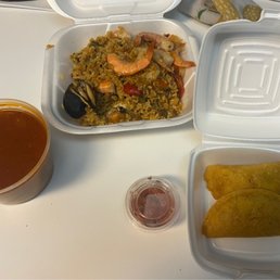Seafood soup, seafood paella and empanadas Seafood soup, seafood paella and empanadas