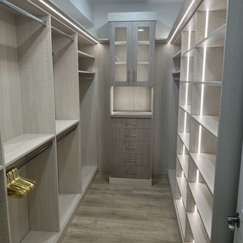 OrganizIT! Inc. Custom Closet & Storage Solutions - Walk-in closet with lighting - Flooring Near Me - Los Angeles, California OrganizIT! Inc. Custom Closet & Storage Solutions - Walk-in closet with lighting - Flooring Near Me - Los Angeles, California