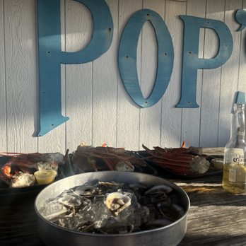Pop's Raw Bar & Restaurant - 3 Lbs of snow crab legs a dozen raw oysters and a Corona with lime ;) - Seafood Near Me - Buxton, North Carolina Pop's Raw Bar & Restaurant - 3 Lbs of snow crab legs a dozen raw oysters and a Corona with lime ;) - Seafood Near Me - Buxton, North Carolina