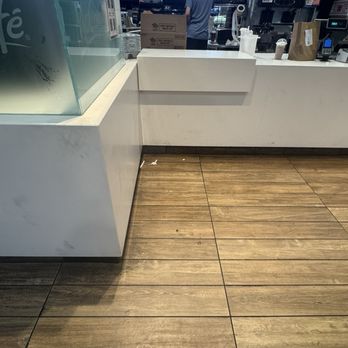 McDonald's - Messy floor, there's also toilet paper all over the bathroom, but I did not take a picture of that. - Coffee & Tea Near Me - Canastota, New York