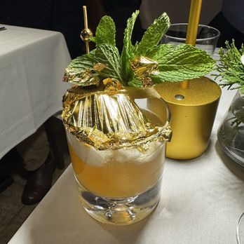 Nahm Thai Cuisine - Bourbon lovers drink with gold on top - Thai Near Me - Alpharetta, Georgia Nahm Thai Cuisine - Bourbon lovers drink with gold on top - Thai Near Me - Alpharetta, Georgia