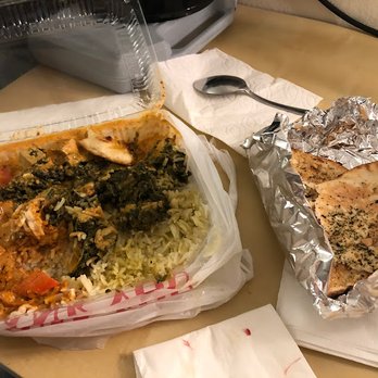 Punjabi Dhaba - chicken combo - tikka masala and saag paneer. garlic naan. $15ish. YUMMMM - Indian Near Me - Berkeley, California