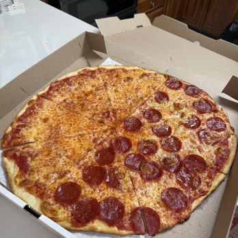 TJ's Pizzeria Cafe - Thin crust pizza half plain and half pepperoni - Pizza Near Me - Oak Ridge, New Jersey TJ's Pizzeria Cafe - Thin crust pizza half plain and half pepperoni - Pizza Near Me - Oak Ridge, New Jersey
