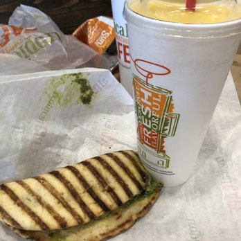 Tropical Smoothie Cafe - Flatbread chicken pesto, Mango smoothie - Sandwiches Near Me - Miami, Florida Tropical Smoothie Cafe - Flatbread chicken pesto, Mango smoothie - Sandwiches Near Me - Miami, Florida
