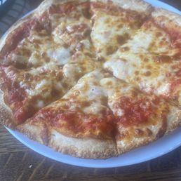 Personal cheese pizza from The Red Pepperoni Pizzeria in Madison, Indiana. Personal cheese pizza from The Red Pepperoni Pizzeria in Madison, Indiana.
