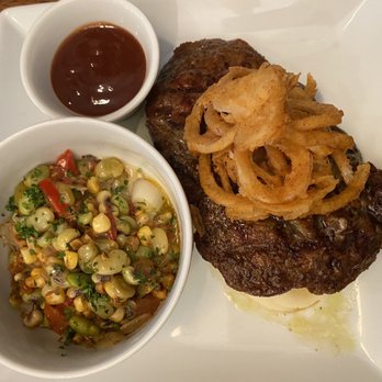 Edgar's Grille - Ribeye with house steak sauce and a side of corn succotash. - New American Near Me - Augusta, Georgia Edgar's Grille - Ribeye with house steak sauce and a side of corn succotash. - New American Near Me - Augusta, Georgia