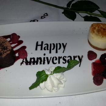 The Capital Grille - Cheesecake with BOMB caramelized brulee topping and Flourless Chocolate Espresso Cake with berries and whipped cream. - Steakhouses Near Me - Plano, Texas The Capital Grille - Cheesecake with BOMB caramelized brulee topping and Flourless Chocolate Espresso Cake with berries and whipped cream. - Steakhouses Near Me - Plano, Texas
