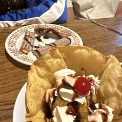 Nachos - Mexican Churros with cream cheese in the center and the churros were crispy outside, never had anything like it, it was fantastic.